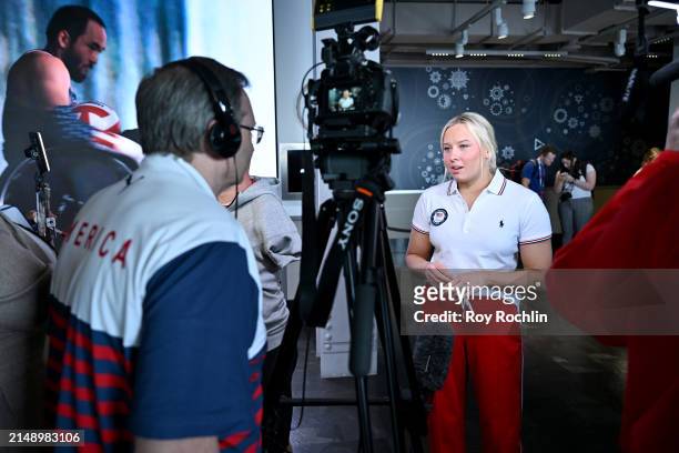 Jessica Long speaks to press as U.S.A. Olympians and Paralympians Light the Empire State Building to Mark 100 Days Out from the Olympics at The...