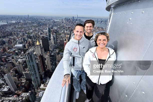 Nick Mayhugh, Hans Henken, and Kaleo Kanahele Maclay attend as U.S.A. Olympians and Paralympians Light the Empire State Building to Mark 100 Days Out...