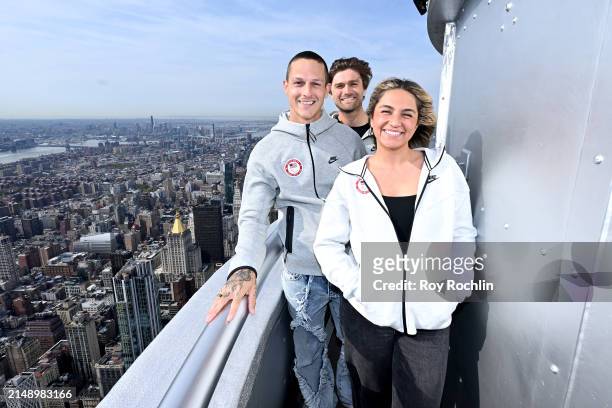 Nick Mayhugh, Hans Henken, and Kaleo Kanahele Maclay attend as U.S.A. Olympians and Paralympians Light the Empire State Building to Mark 100 Days Out...