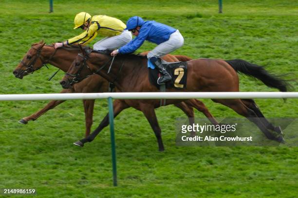 Oisin Orr riding Pretty Crystal win The Lanwades Stud Nell Gwyn Stakes from William Buick and Dance Sequence at Newmarket Racecourse on April 17,...