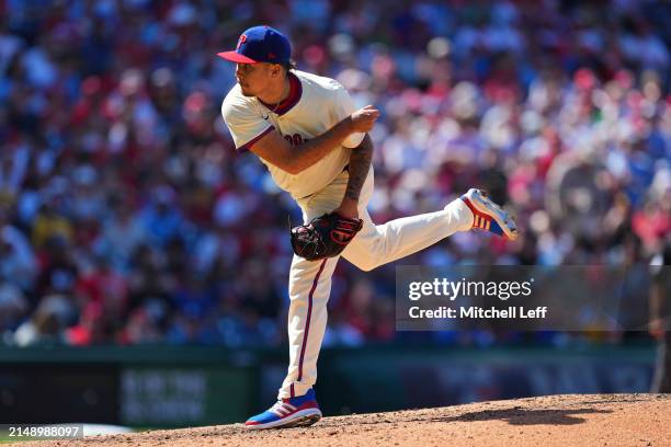 Orion Kerkering of the Philadelphia Phillies throws a pitch against the Pittsburgh Pirates at Citizens Bank Park on April 14, 2024 in Philadelphia,...