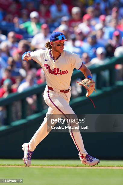 Alec Bohm of the Philadelphia Phillies throws the ball to second base against the Pittsburgh Pirates at Citizens Bank Park on April 14, 2024 in...