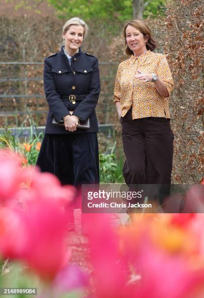Sophie, Duchess Of Edinburgh speaks with head gardener Sarah Mead as they view flowers during her visit to Yeo Valley Farm on April 17, 2024 in...