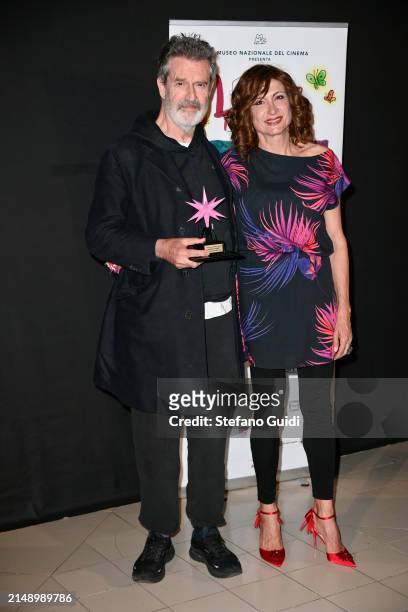 Rupert Everett and Vladimir Luxuria attends the "Stella Della Mole" prize ceremony during the 39th Lovers Film Festival 2024 on April 17, 2024 in...