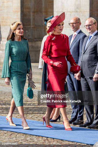 Queen Maxima of The Netherlands welcomes Queen Letizia of Spain with an official welcome ceremony at the Royal Palace on April 17, 2024 in Amsterdam,...