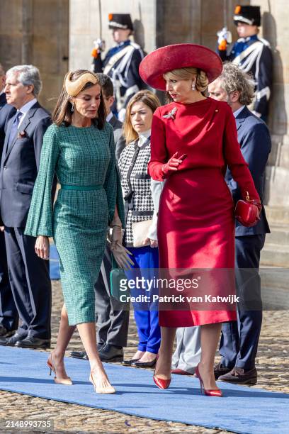 Queen Maxima of The Netherlands welcomes Queen Letizia of Spain with an official welcome ceremony at the Royal Palace on April 17, 2024 in Amsterdam,...