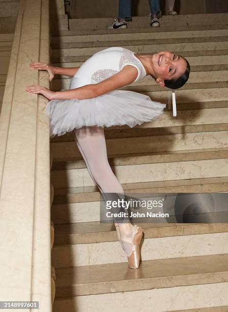 Student from the Youth America Grand Prix prepares to break the Guinness World Record for Most Ballerinas En Pointe Simultaneously at The Plaza Hotel...