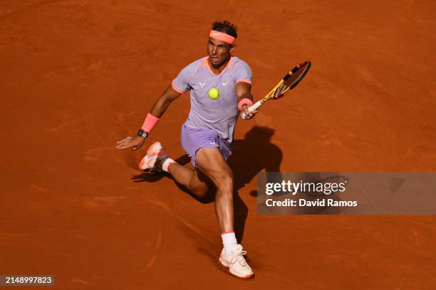 Rafa Nadal of Spain plays a forehand against Alex de Minaur of Australia during their match of day three of the Barcelona Open Banc Sabadell at Real...