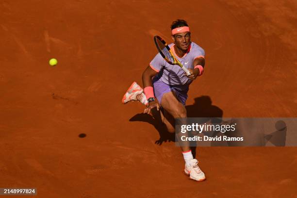 Rafa Nadal of Spain plays a forehand against Alex de Minaur of Australia during their match of day three of the Barcelona Open Banc Sabadell at Real...