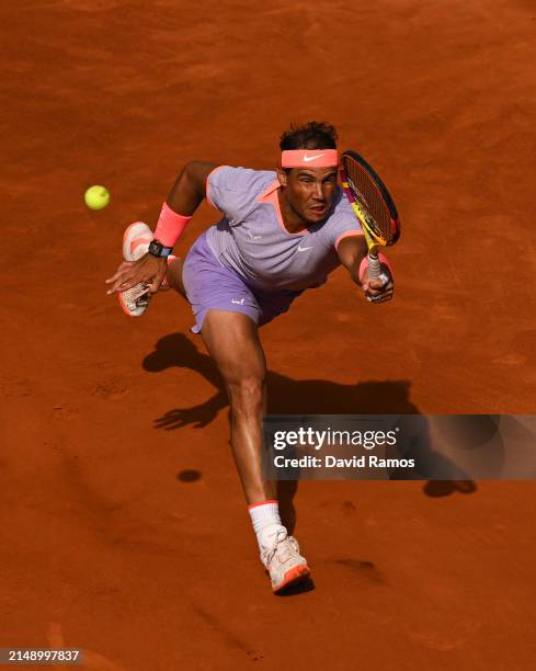 Rafa Nadal of Spain plays a forehand against Alex de Minaur of Australia during their match of day three of the Barcelona Open Banc Sabadell at Real...