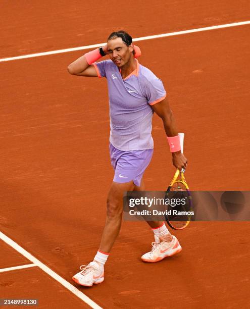 Rafa Nadal of Spain shows his dejection after losing against Alex de Minaur of Australia during their match of day three of the Barcelona Open Banc...