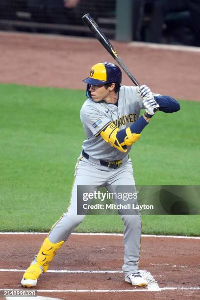 Christian Yelich of the Milwaukee Brewers prepares for a pitch during a baseball game against the Baltimore Orioles at Oriole Park at Camden Yards on...