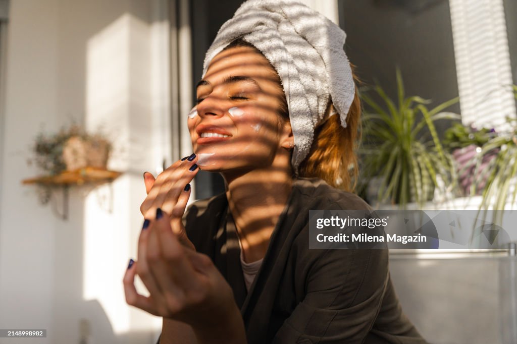 Young woman is nourishing herself