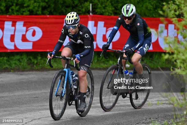 Sara Martin of Spain and Movistar Team and Julie Van De Velde of Belgium and Team AG Insurance - Soudal Team compete in the breakaway during the 27th...