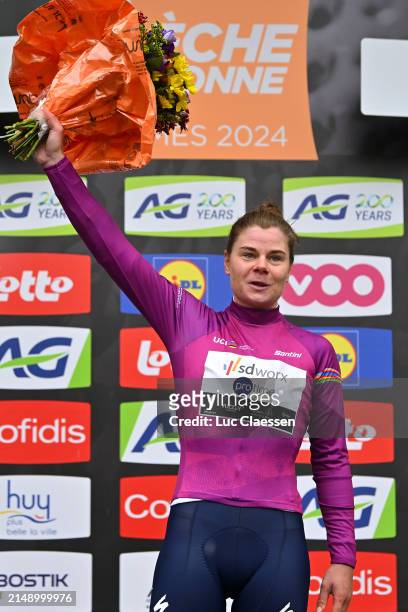 Lotte Kopecky of Belgium and Team SD Worx - Protime celebrates at podium as Pink UCI Women’s WorldTour Leader Jersey winner during the 27th La Fleche...
