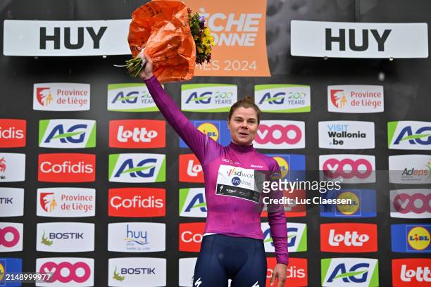 Lotte Kopecky of Belgium and Team SD Worx - Protime celebrates at podium as Pink UCI Women’s WorldTour Leader Jersey winner during the 27th La Fleche...
