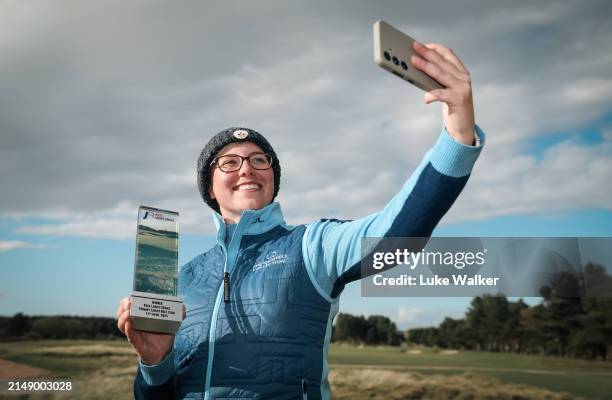 Billy-Jo Smith poses with the trophy during The Rose Ladies Series at the Forby Ladies Golf Club on April 17, 2024 in Formby, England.