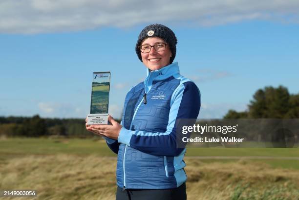Billy-Jo Smith poses with the trophy during The Rose Ladies Series at the Forby Ladies Golf Club on April 17, 2024 in Formby, England.