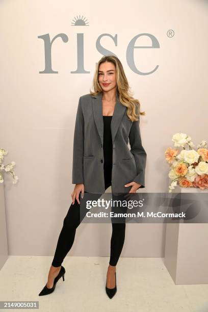 Zara McDermott showcases her new Everyday Essentials clothing brand venture RISE on April 17, 2024 in London, England.