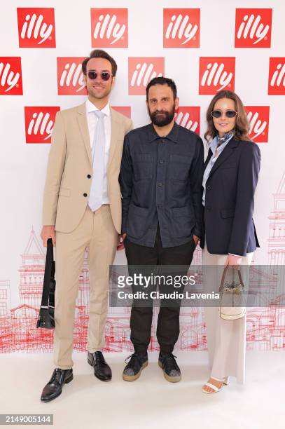 Marina Ksandr, Matteo Attruia and Simon Ksandr attend the illy Art Collection Presentation During Art Biennale 2024 on April 17, 2024 in Venice,...