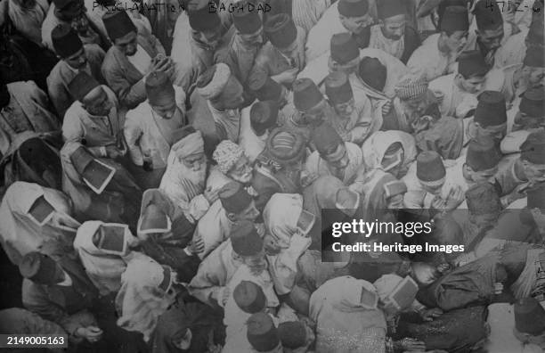 Proclamation, Baghdad, 1917. A crowd of men and women in Baghdad, Iraq, after the conquering of the city by the British Army in March 1917 during...