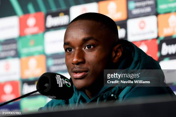 Moussa Diaby of Aston Villa talks to the press during the Aston Villa press conference ahead of their UEFA Europa Conference League 2023/24 match...