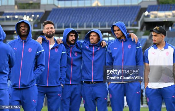 Olivier Giroud, Yacine Adli, Tijjani Reijnders and Malick Thiaw look on during a pitch inspection before the UEFA Europa League 2023/24 quarter-final...