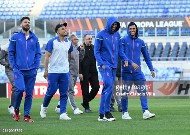 Olivier Giroud, Noah Okafor, Tijjani Reijnders and Malick Thiaw look on during a pitch inspection before the UEFA Europa League 2023/24 quarter-final...