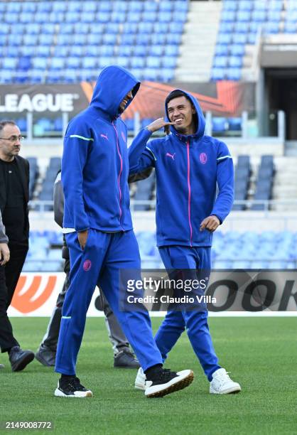 Tijjani Reijnders and Malick Thiaw look on during a pitch inspection before the UEFA Europa League 2023/24 quarter-final second leg training and...