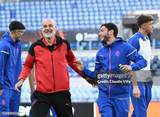 Head coach AC Milan Stefano Pioli and Davide Calabria of AC Milan look on during a pitch inspection before the UEFA Europa League 2023/24...