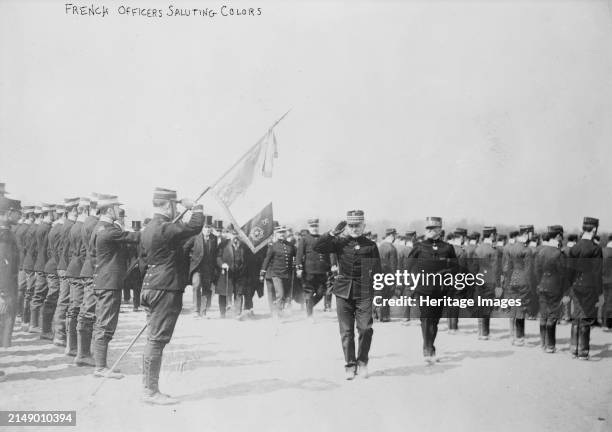 French officers saluting colors, between circa 1914 and circa 1915. Probably shows General Ferdinand Foch , who served in the French army during...