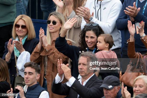Ana Maria Parera, Maria Isabel Nadal, Xisca Perello Nadal and Rafael Junior Nadal wave to Rafael Nadal of Spain after his second round defeat against...