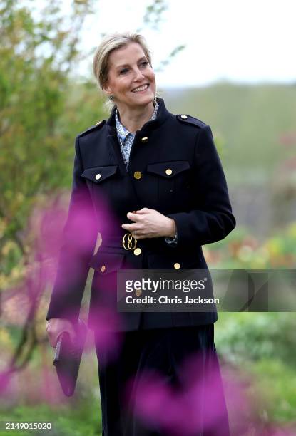 Sophie, Duchess Of Edinburgh smiles amongst flowers during her visit to Yeo Valley Farm on April 17, 2024 in Blagdon, England.