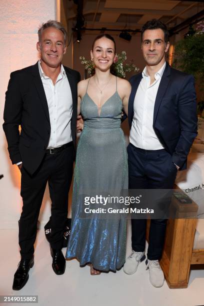 Marco Girnth, guest and Gabriel Merz attend the Jupiter Awards at Altonaer Kaispeicher on April 17, 2024 in Hamburg, Germany.