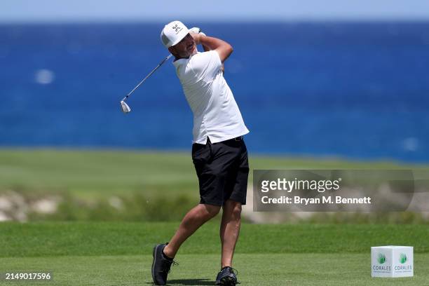 Scott Piercy of the United States plays his shot from the ninth tee during a practice round prior to the Corales Puntacana Championship at Puntacana...