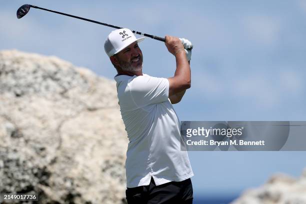 Scott Piercy of the United States plays his shot from the eighth tee during a practice round prior to the Corales Puntacana Championship at Puntacana...