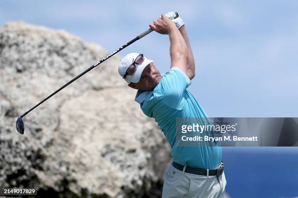 Adam Long of the United States plays his shot from the eighth tee during a practice round prior to the Corales Puntacana Championship at Puntacana...