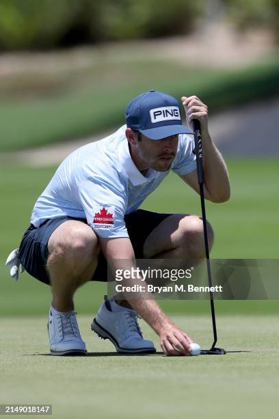 Harrison Endycott of Australia looks over a putt on the seventh green during a practice round prior to the Corales Puntacana Championship at...