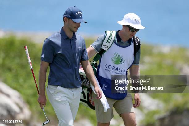 Nicolai Højgaard of Denmark and his caddie walk up the eighth fairway during a practice round prior to the Corales Puntacana Championship at...
