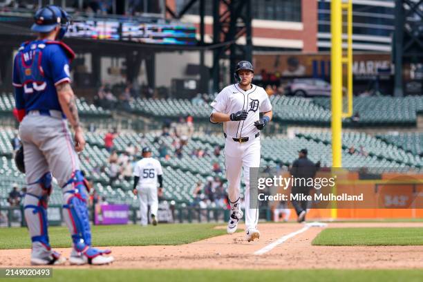 Parker Meadows of the Detroit Tigers jogs to home plate after hitting a one-run home run during the seventh inning of a game against the Texas...