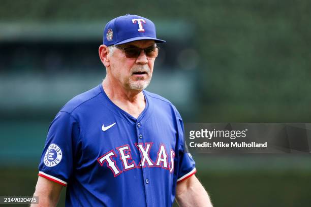Texas Rangers manager Bruce Bochy walks back to the dugout during the seventh inning of a game against the Detroit Tigers at Comerica Park on April...