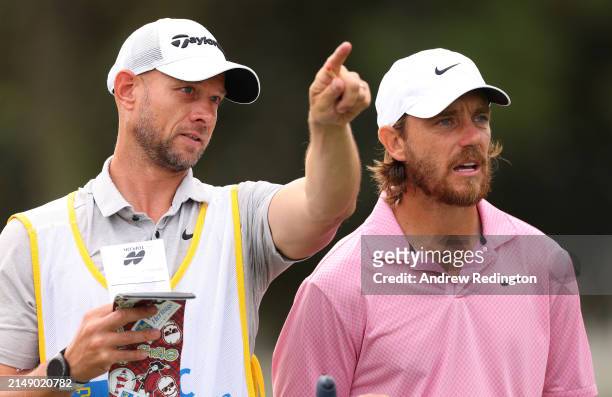 Tommy Fleetwood of England and his caddie Adrian Rietveld in action during the pro-am prior to the RBC Heritage at Harbour Town Golf Links on April...