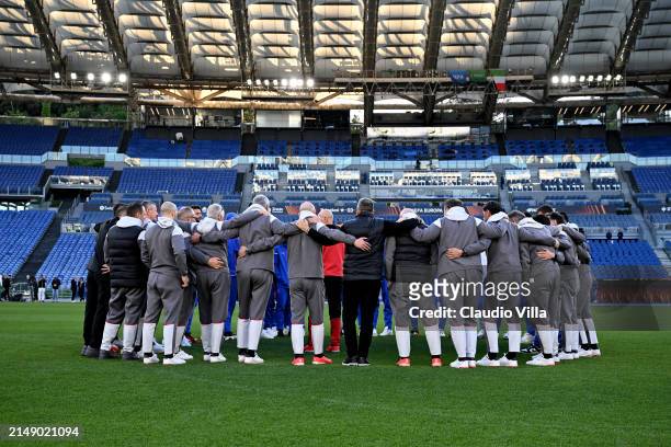 Players of AC Milan look on during a pitch inspection before the UEFA Europa League 2023/24 quarter-final second leg training and press conference at...