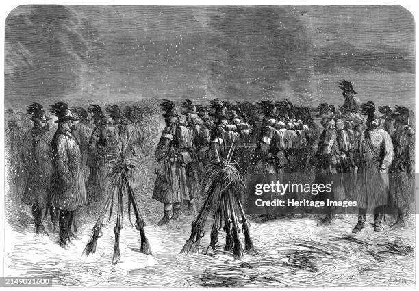 Austrian camp in front of the Dannewerk: the 18th Bohemian Chasseurs in a snowstorm - from a sketch by our special artist, 1864. 'The country between...