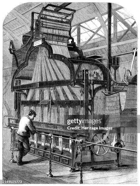 The International Exhibition: Swiss jacquard-loom for weaving ribbons - from a photograph by the London Stereoscopic Company, 1862. 'This...