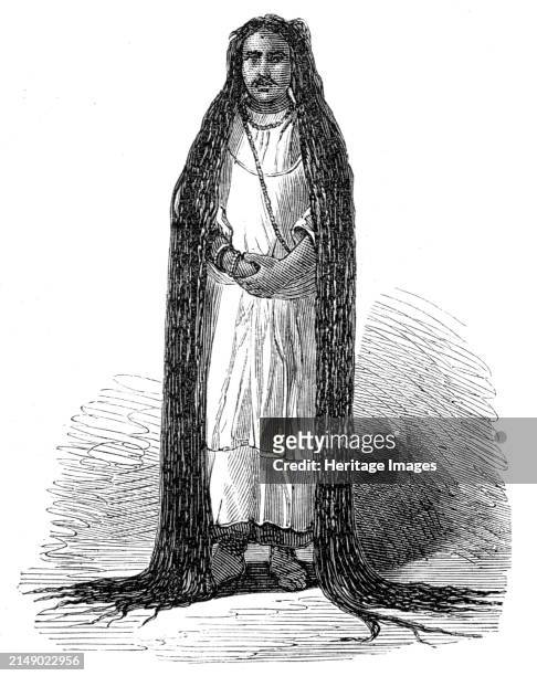 Fakir, or Mussulman saint, of Hoshungabad, Central India, 1864. 'The extraordinary figure delineated in our Engraving is the reverend Wuzzeer Alee...