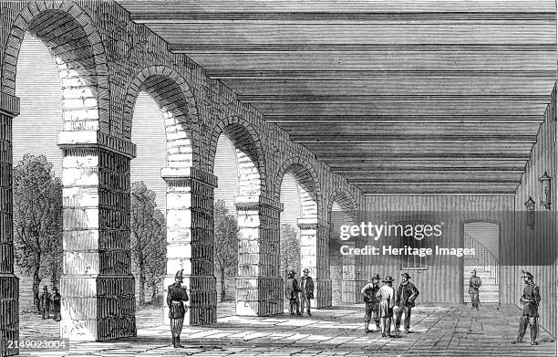 Paris Demolitions - the Hôtel des Haricots, or prison of the National Guard of Paris: covered promenade, 1864. View of '...the Hôtel des Haricots, as...