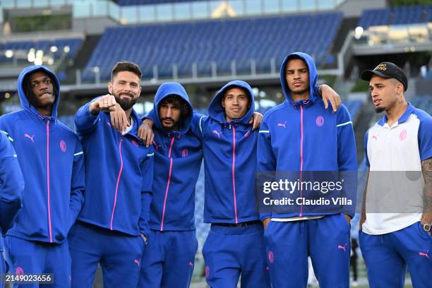 Rafael Leao, Olivier Giroud, Yacine Adli, Tijjani Reijnders, Malick Thiaw and Noah Okafor look on during a pitch inspection before the UEFA Europa...