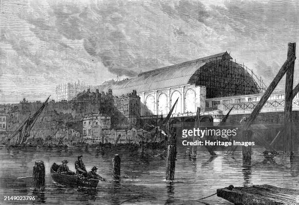 The Charing-Cross railway station, as seen from the river [Thames, London], 1864. 'This magnificent structure, with a semicircular roof of iron and...