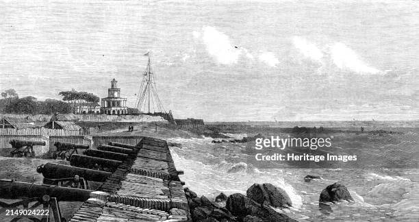 The lighthouse and flagstaff at Colombo, Ceylon, 1864. Engraving from a photograph by Messrs. Slinn and Co. Coastal scene in what is now Sri Lanka,...